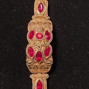 Gold and red crystal, ornate bracelet